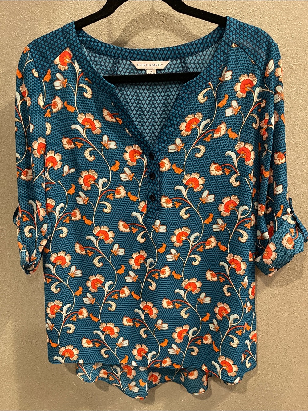 Counterparts Teal Floral Henley Blouse with Red, Orange and Cream Accents